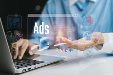 Business Person Analyzing Digital Advertising Data with Charts and Graphics on Laptop, Business concept
