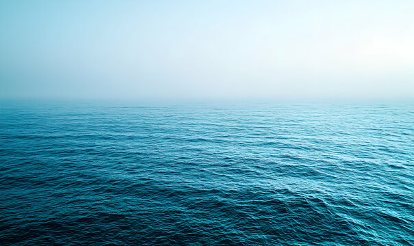 Calm Ocean Water with Soft Foggy Horizon and Gentle Waves
