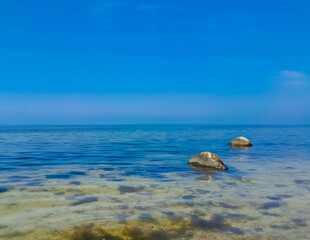 Seascape of Baltic Sea crystal water, rocks and sea bottom.