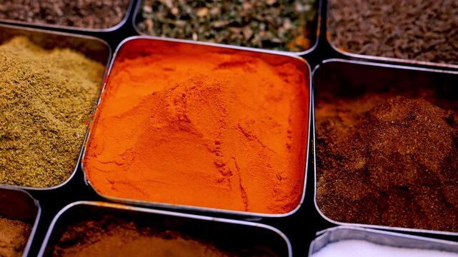 Spices. Various Indian Spices. Spice and herbs in a restaurant. Assortment of Seasonings, condiments. Cooking ingredients, flavor. 4K UHD video