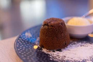 Lava Cake with Ice Cream on a Blue Plate