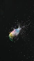 Soap bubble bursting with colorful rainbow trail, subtle grain, soft focus edges, vintage photo. Photo background for your design, blurred motion