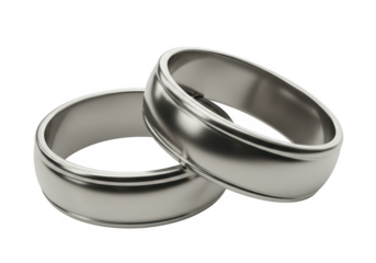 A close-up of interlocking silver wedding bands isolated on transparent background