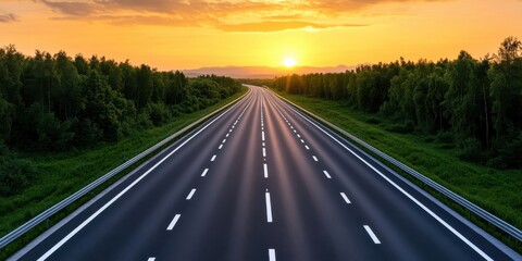 Fototapeta premium Sunrise over modern highway interchange complex aerial view transport concept serene landscape