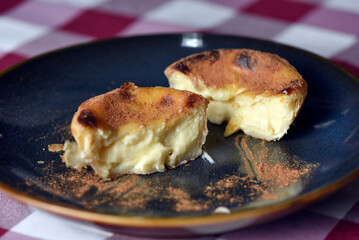 pastel de belem creamy cake topped with cinnamon dessert