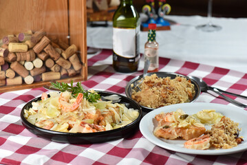 codfish typical Portuguese dish baked cod with onion garlic peppers and potatoes rustic Portuguese food salted fish cooked olive oil