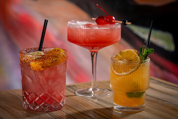 A Selection of 3 colorful cocktails.