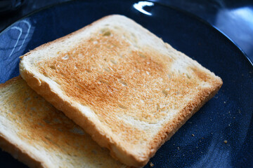 Toast bread slices on a plate.