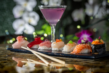 A Selection of Colorful Sushi with a Peaflower Martini.