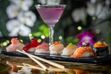 A Selection of Colorful Sushi with a Peaflower Martini.