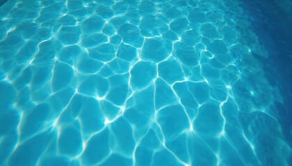 Obraz premium Top view of bright blue swimming pool with ripple surface reflecting sun. Clear fresh water creates abstract pattern. Use as texture wallpaper or background, holiday mood, vacation relaxation.