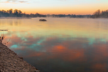 a winter foggy sunrise along the Ticino riverbank, Besate, Milano province