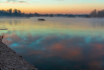 a winter foggy sunrise along the Ticino riverbank, Besate, Milano province