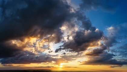 Obraz premium dramatic cloudy sky with sunset