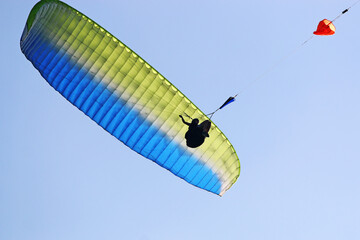 Paraglider being towed by a winch