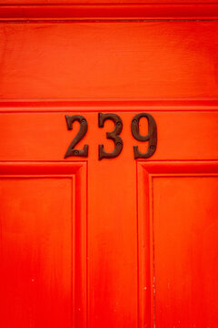 Door number 239 in red