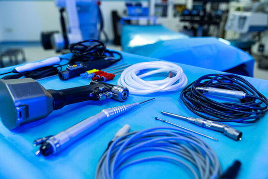 Neurosurgery tools and equipment. Various surgical instruments and equipment are prepared on a table in the neurosurgery operating room.