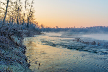 a winter foggy sunrise along the Ticino riverbank, Besate, Milano province