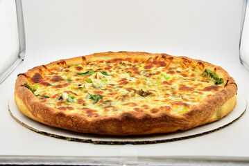 Freshly Baked Pizzas with Golden Crust and Tasty Toppings