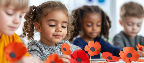 Kids creating flag-themed cards in classroom for Memorial Day remembrance