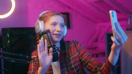 Teen girl woman happy female game streamer blogger influencer vlogger cyber sport gamer headphones...