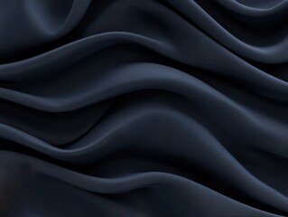 Obraz premium Elegant dark fabric draping softly, creating smooth waves and shadows