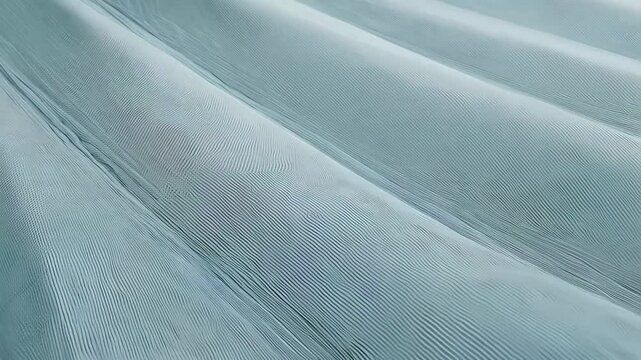 Close-up of diagonal textured lines in light gray creating a subtle pleated pattern with a ribbed, layered abstract effect