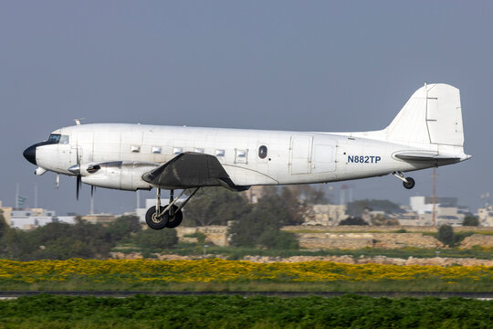 Luqa, Malta - March 15, 2025: Douglas DC-3C-TP (REG. N882TP) still in service after being first flown 80 years ago.