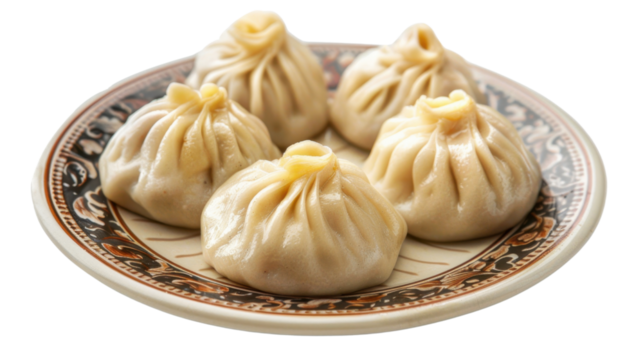 Steamed dumplings resting on a decorated plate with transparent background