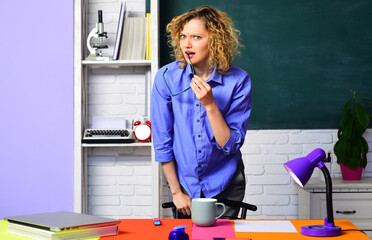 Education and learning. Frowning school teacher, docent or university professor giving lesson to...