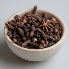 Fototapeta premium Cloves, star anise, spice bowl, studio, cooking