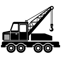 A yellow construction crane and truck with heavy equipment for transportation and lifting in an industrial setting
