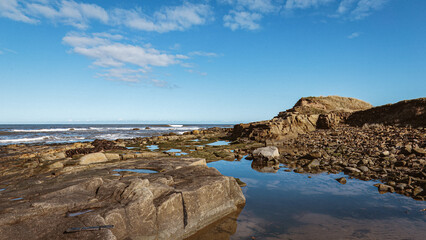 Watching the tide coming in on Cresswell Beach Northumberland