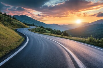 Scenic sunset over winding mountain road with blurred car motion in a serene summer landscape