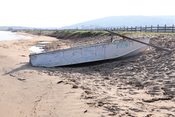 old boat on shore