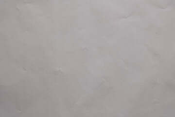 Texture and Abstract Background: The subtle play of light and shadow on a crumpled off white sheet creates an abstract canvas