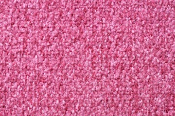 Texture of pink woven fabric as background, top view