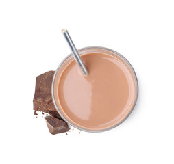 Tasty chocolate milk in glass and pieces of chocolate isolated on white, top view