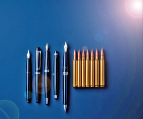 World Press Freedom Day Pens vs Bullets, Freedom of Press Concept, Journalism, Media Rights, Peaceful Protest, Blue Background, Copyspace