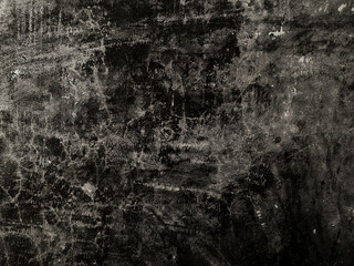 Black dark grunge concrete wall background with aged texture. Abstract wall texture for design, editing, overlays, and digital projects.