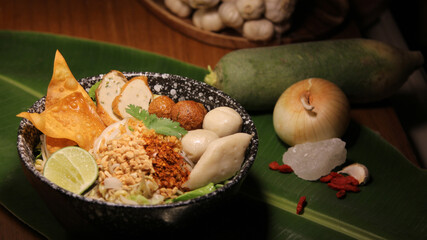 famous noodle food concept Delicious fish ball noodles served with fresh ingredients and garnishes