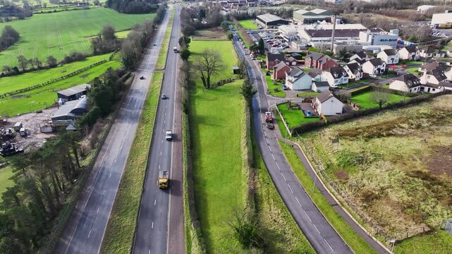 Aerial video of A8 Larne road, Ballymena Belfast road, Millbrook Larne Co Antrim Northern Ireland 14-03-25