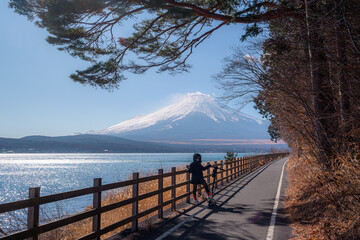 Happy tourist traveler woman enjoying with mount fuji in japan, spring and summer, Japan travel...