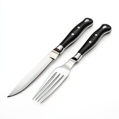 Naklejka premium Two knives and forks are shown on a white background