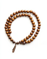 Obraz premium A long brown string of beads is tied together