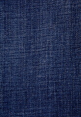 Blue denim jeans fabric background texture. Blue denim jeans fabric cloth textile material.
