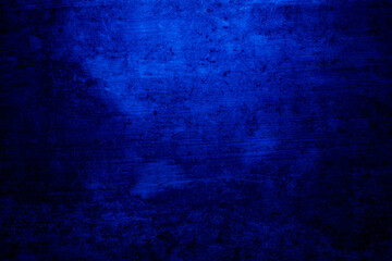 Abstract grunge background with copy space. Classic blue concrete wall. Texture for layout and graphic design.