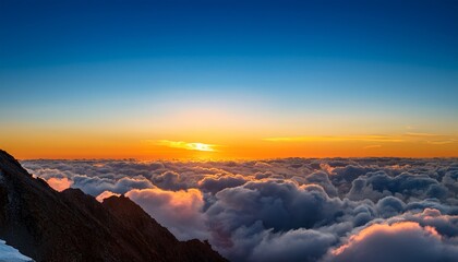 above the vibrant clouds at sunset with clear sky and copy space