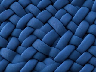 Obraz premium Close-up of a textured blue woven fabric showcasing intricate patterns and depth