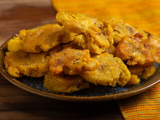 Plate full of tostones. Fried plantain, typical cuban food